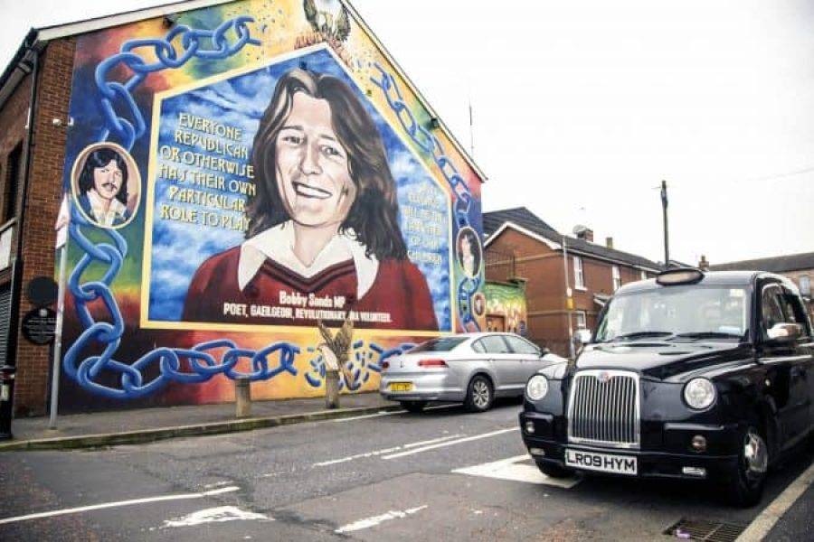 The Peace Wall along Cupar Way, West Belfast — separating the nationalist Falls Road from the unionist Shankill Road